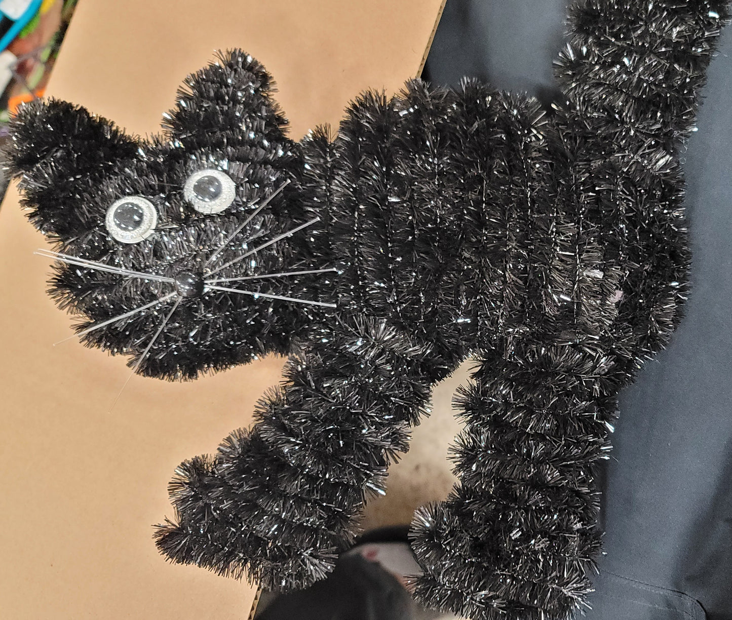 Tinsel black cat