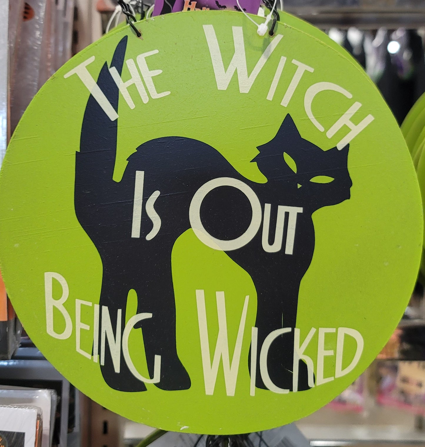 The Witch Is Out Being Wicked” Hanging Sign
